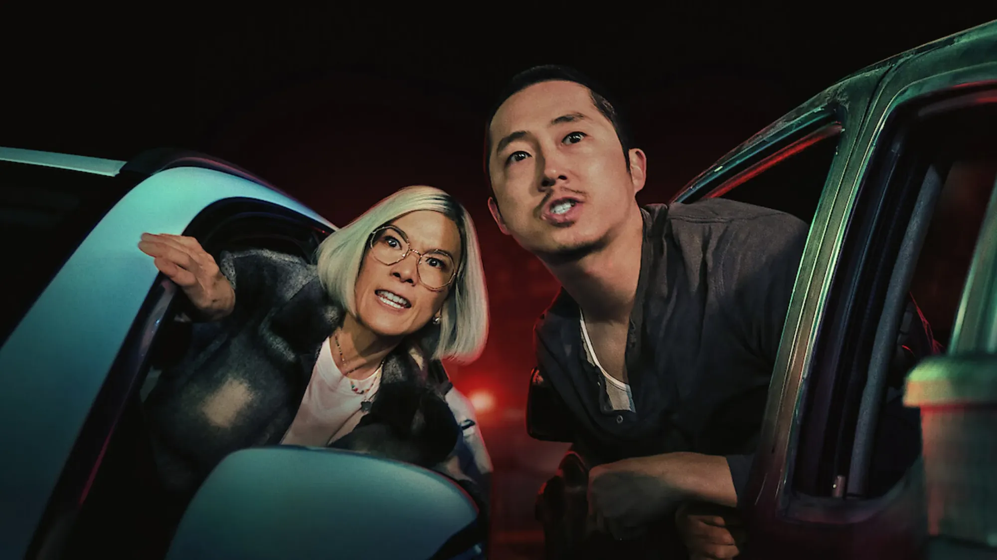Ali Wong and Steven Yeun as Amy Lau and Danny Cho in "Beef", a television show on Netflix.