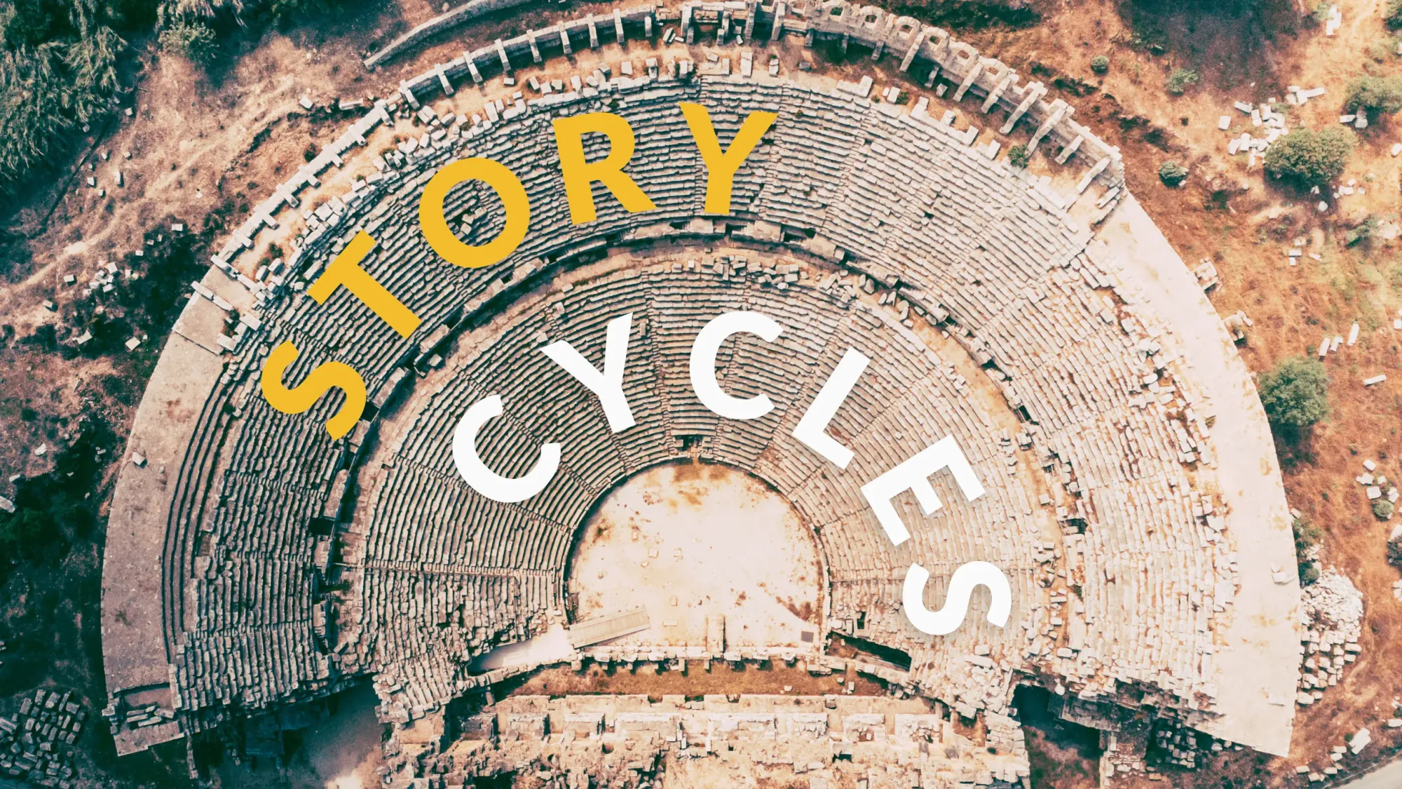Ancient Greek amphitheater with the words "Story Cycles" curving around the length of the theatre.